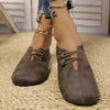 Side view of women's slip-on flats with TPR sole and polished leather upper