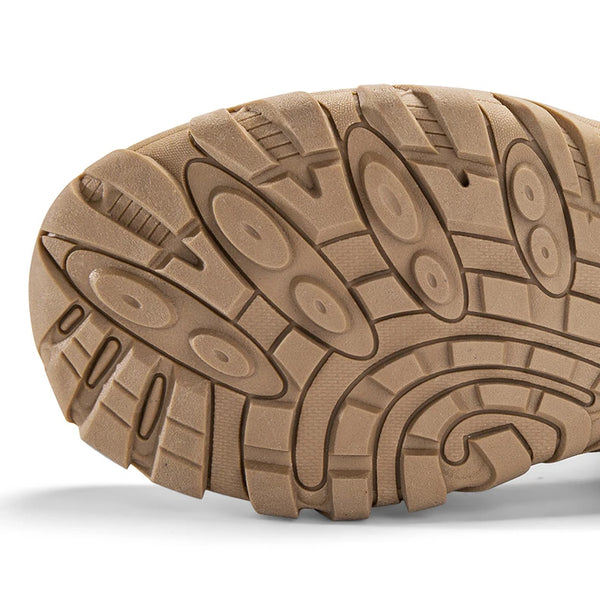 Lightweight Trailblazer Boots in gray, perfect for mountain climbing.