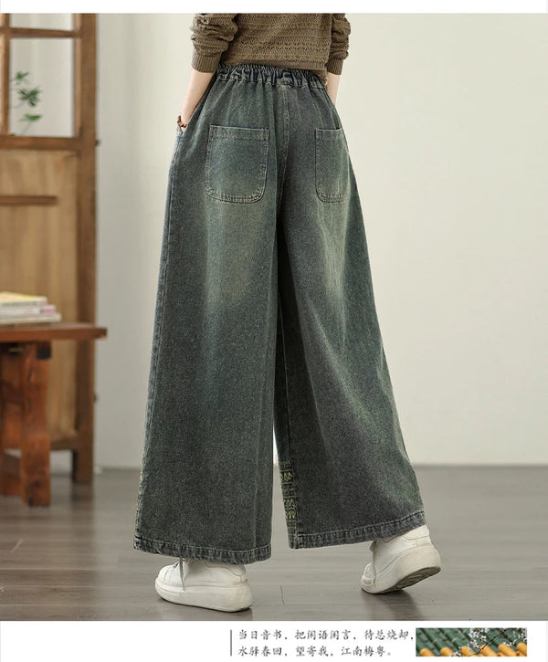 Vintage embroidered wide-leg jeans for women, featuring elastic waist and ethnic-inspired design for autumn fashion.
