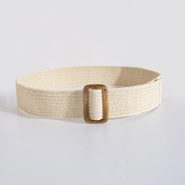 Chic woven belt for women in minimalist summer style, adjustable for perfect fit, ideal for casual or dressy looks.