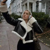 Chic cropped leather and wool blend jacket for women with fur trim, zipper closure, and turn-down collar for fall and winter.