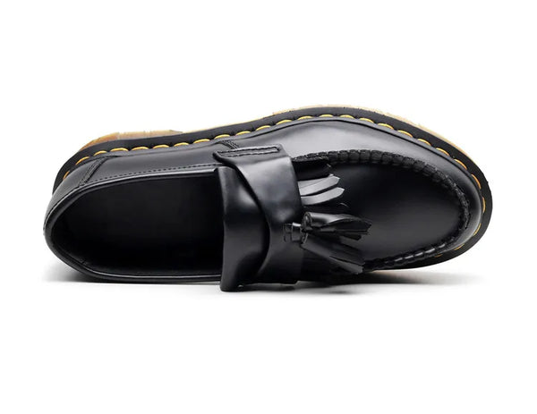 Black tassel loafers showcasing a true-to-size fit for easy wear.