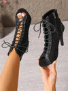 Lace-up stage boots with alluring cutout design and leg-lengthening silhouette