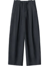 Flowing wide leg trousers with elegant pleating and customizable drawstring waist for perfect fit