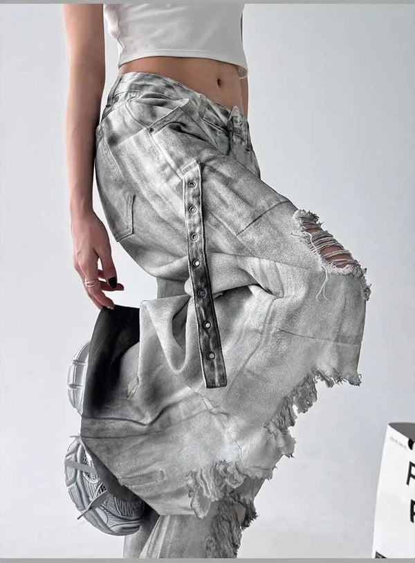 Trendy high-waist wide-leg ripped jeans for women with tie-dye and distressed detailing, perfect for casual street style.