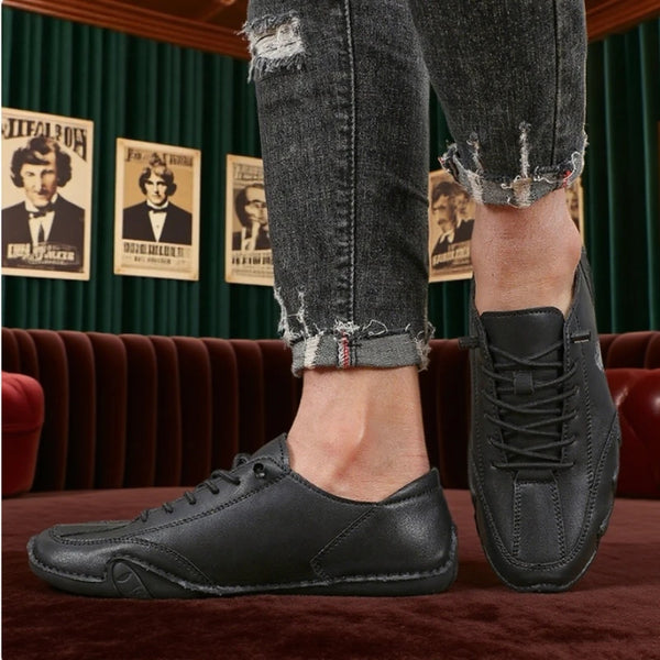 Waterproof men's ankle boots with breathable construction and solid pattern design for versatile everyday wear