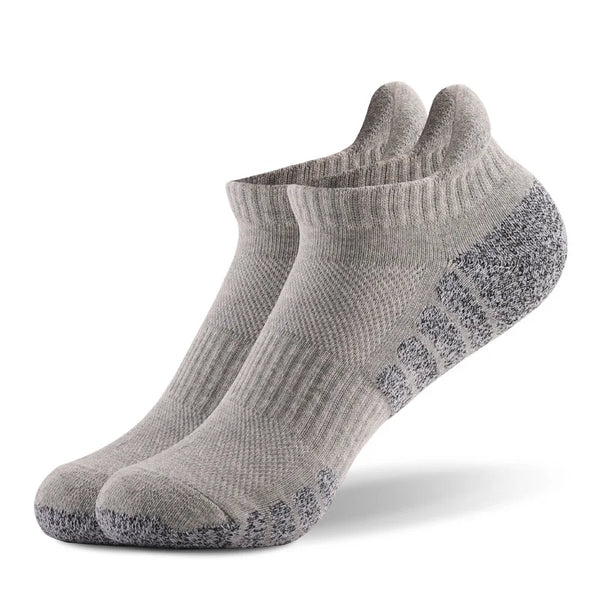 Close-up of thick terry cushioning in running socks, providing plush support for road warriors.