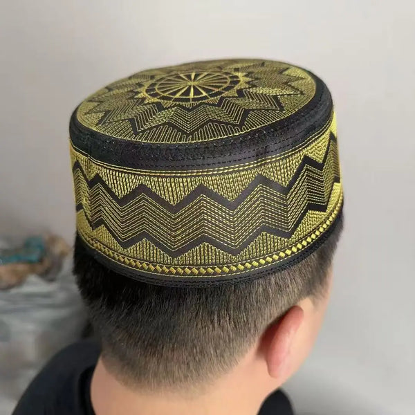 Handcrafted Muslim kufi cap with shimmering gold geometric embroidery for daily prayers