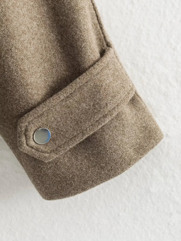 Zip-front jacket with sash belt and turtleneck perfect for crisp autumn mornings
