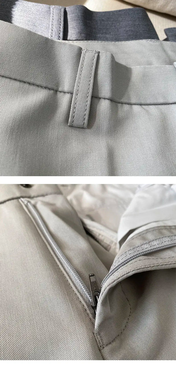 Slim fit business dress pants for men in black, khaki, and navy blue, perfect for autumn office wear and smart casual events.