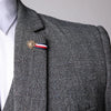 Men's trio suit set displayed on a mannequin, highlighting versatile style.