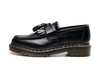 Black tassel loafers featuring a non-slip pig split insole for stability.