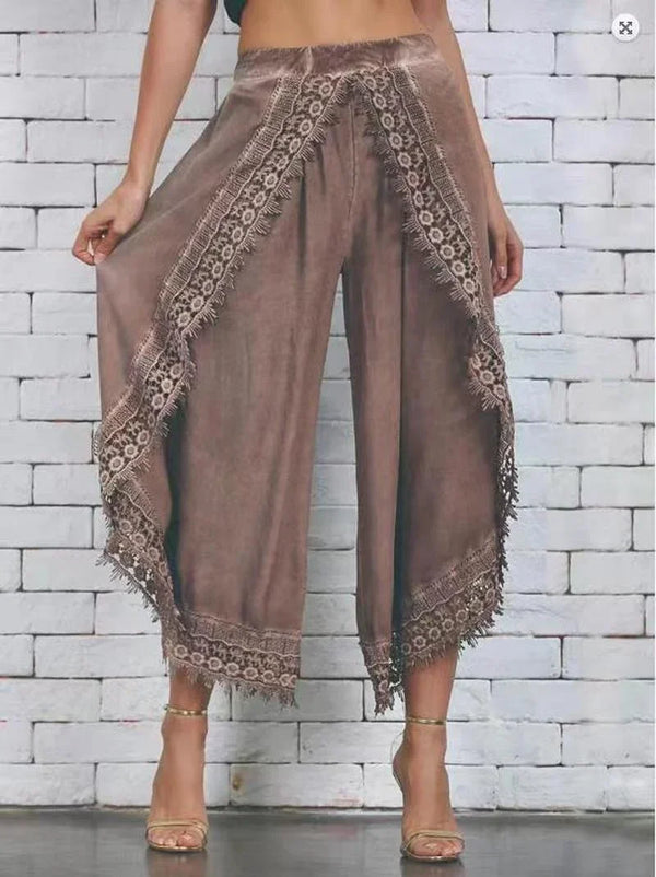 Chic summer harem pants with tassel detail, lightweight, relaxed fit, ankle-length, perfect for casual outings and festivals.