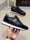 Durable black leather loafers for men with elegant design.