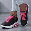 Chunky white sneakers with elevated platform for height boost