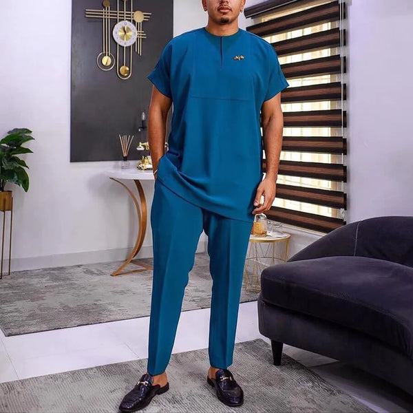 Colorful African print shirt and pants set with authentic patchwork artistry and cultural patterns