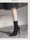 Chic black ankle boots with slim high heels, pointed toe design, perfect for autumn and winter fashion. Stylish slip-on footw