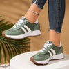 White breathable sneakers featuring unique patchwork textile pattern