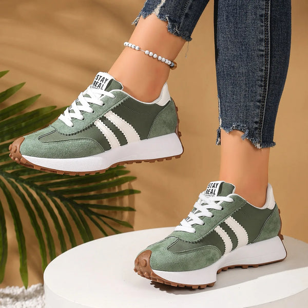 White breathable sneakers featuring unique patchwork textile pattern
