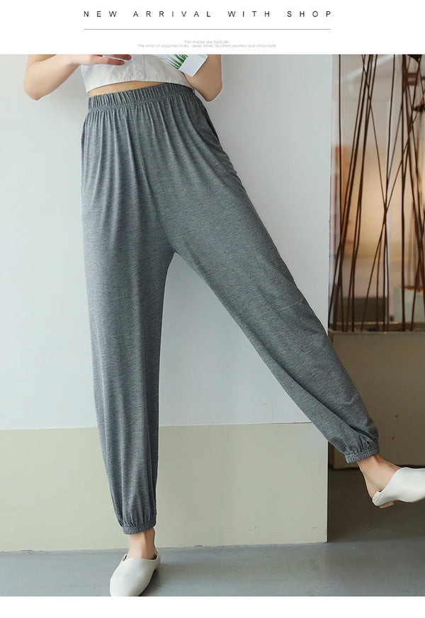 Comfy modal women's pajama pants with elastic waistband, ankle-length design, perfect for lounging and sleep in all seasons.