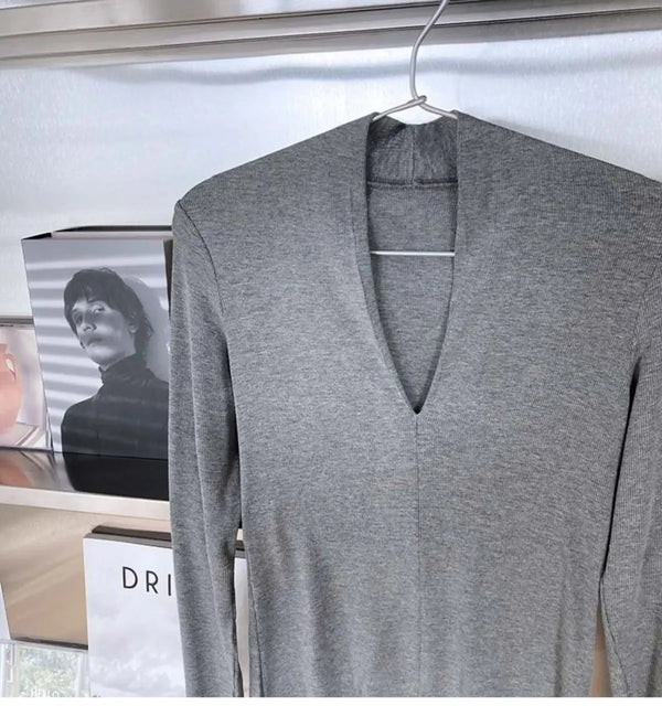 Elegant V-Neck Women's Blouse with Long Sleeves in solid color, perfect for casual and office wear, made from cotton-polyeste