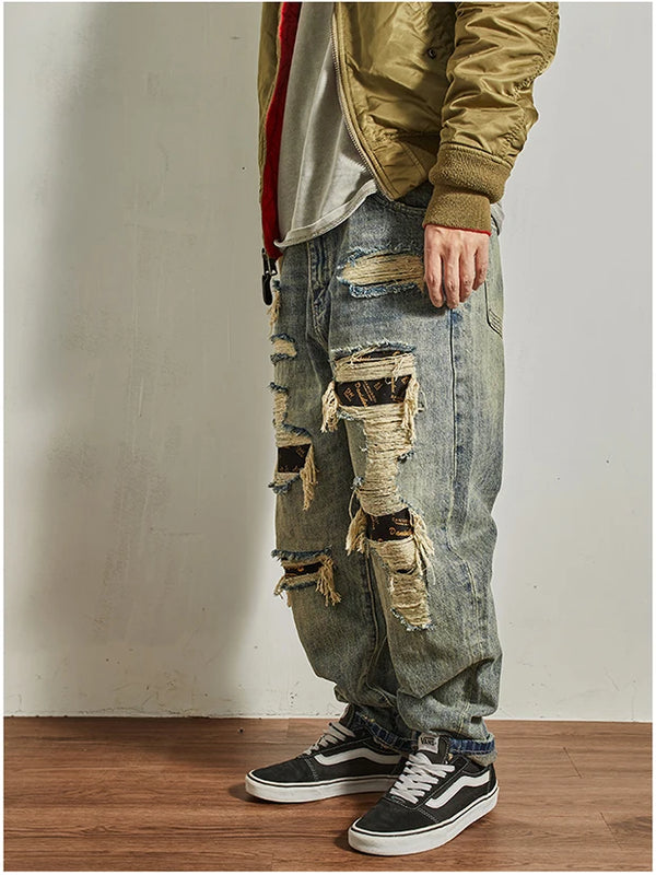 Model demonstrating freedom of movement in Rebel Spirit Distressed Jeans during outdoor activities.