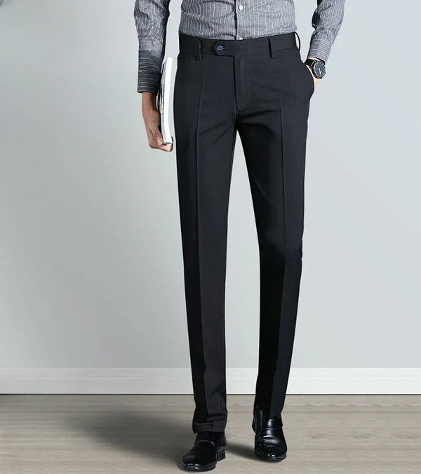 Elegant slim fit men's suit trousers in black, perfect for business attire and formal events, crafted from cotton-polyester b