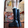 Chic black platform knee-high fashion boots with wedge heel, waterproof design, and bling accents for stylish women.