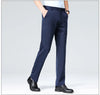 Detail shot of zipper fly and flat front construction on professional business pants