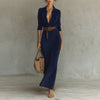 Autumn Whispers dress displayed on a mannequin, showcasing its timeless design and rich color.
