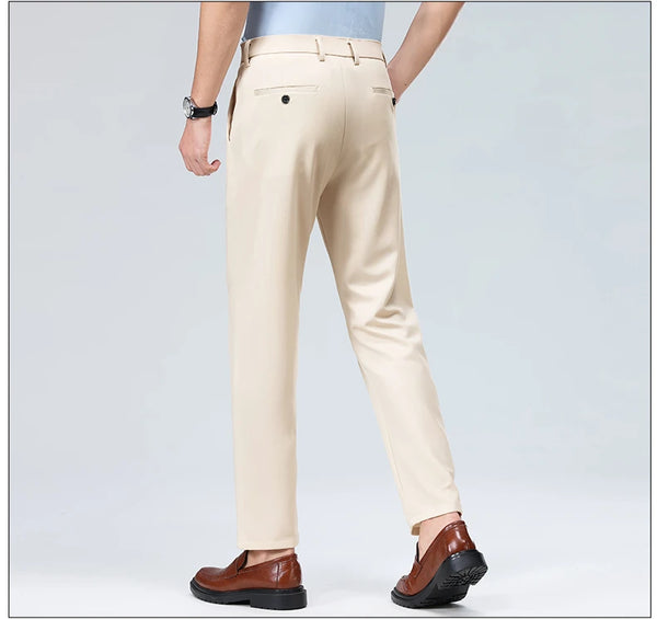 High drape dress pants in charcoal maintaining sharp crease throughout busy workday