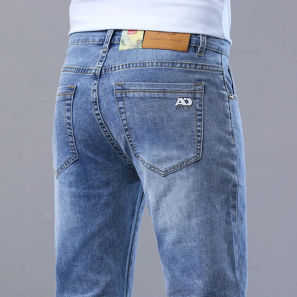 Men's slim fit stretch denim jeans with tapered leg