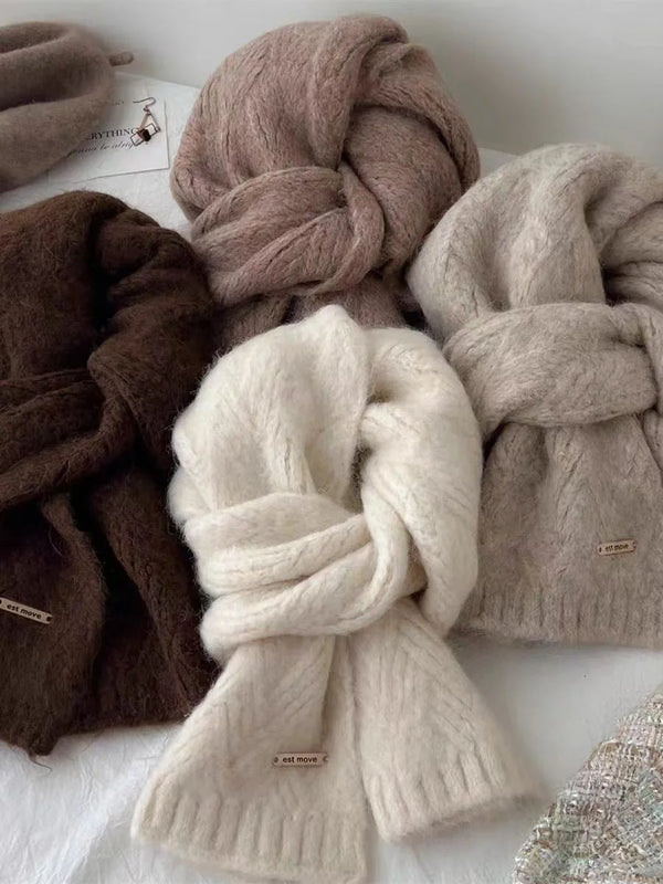 Elegant mink fur scarf styled with jewelry, adding sophistication to a winter ensemble.