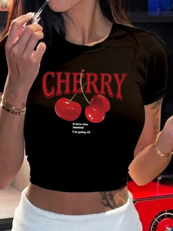 Y2K style cherry print crop top showing fitted cut and playful retro fruit design