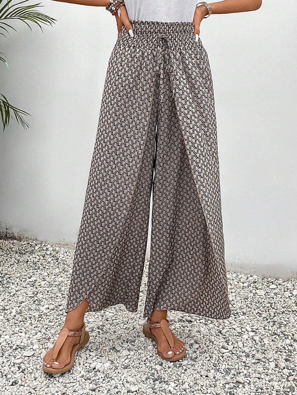Floral wide-leg chiffon pants for women, ankle-length, elastic waist, perfect for summer fashion and casual chic outfits.