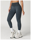 Coral pink high waist yoga leggings featuring a comfortable fit.
