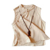 Light blue linen top with open stitch design for summer elegance.