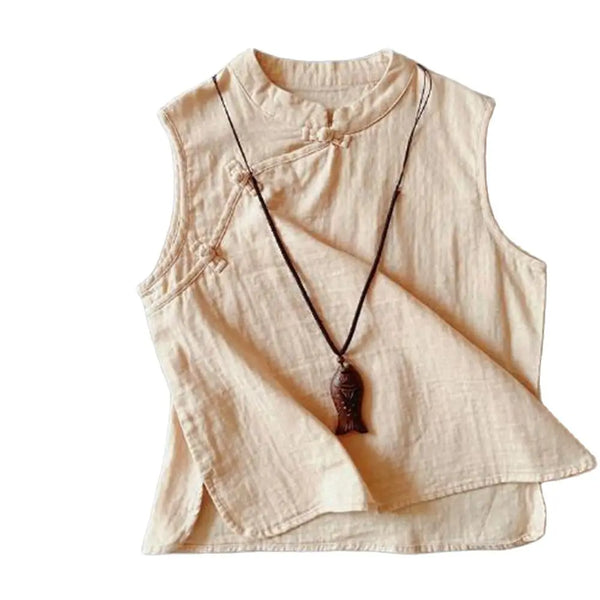 Light blue linen top with open stitch design for summer elegance.