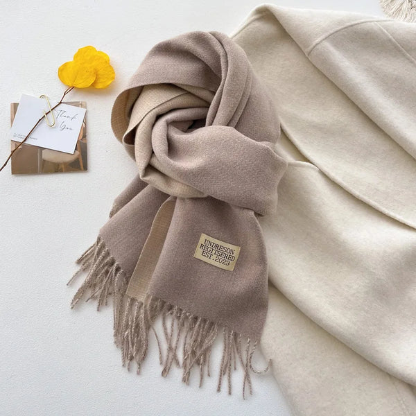 Elegant women's scarf in soft blush, perfect for adding warmth to any outfit.