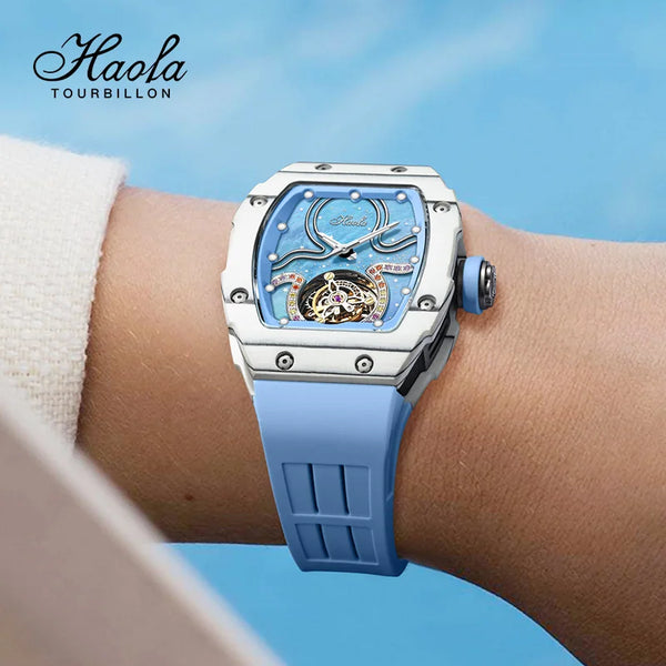 Luminous details of the Timeless Elegance watch glowing in low light.
