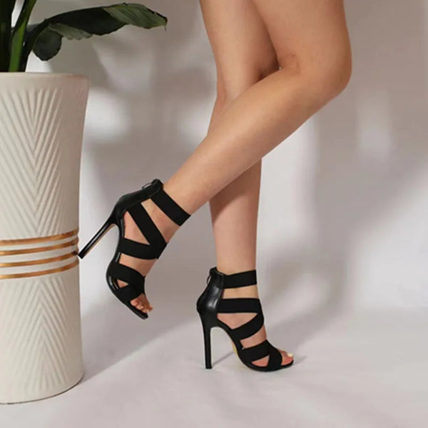 Stylish navy blue stiletto sandals with premium PU upper and rubber outsole.