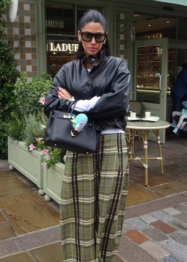 Chic faux leather bomber jacket for women, perfect for autumn fashion and versatile layering with a stylish turtleneck collar