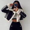 Chic cropped leather and wool blend jacket for women with fur trim, zipper closure, and turn-down collar for fall and winter.