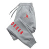 Unisex fitness pants featuring eye-catching printed pattern and breathable knit construction