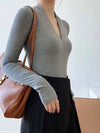 Elegant V-Neck Women's Blouse with Long Sleeves in solid color, perfect for casual and office wear, made from cotton-polyeste