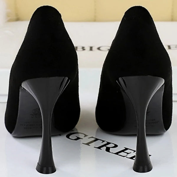 Elegant footwear featuring a sleek design and classic color.