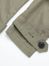 Elegant trench coat with turn-down collar styled for professional setting