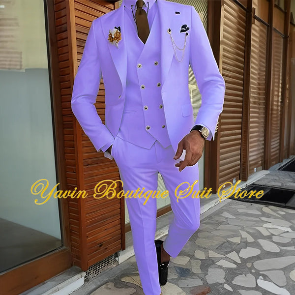 Groom smiling in a sophisticated double-breasted wedding suit.