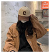 Sunlit Days cap paired with casual attire for a stylish vibe.