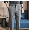Men's slim fit dress pants in British style with elastic waist, perfect for casual or formal occasions, made from polyester b